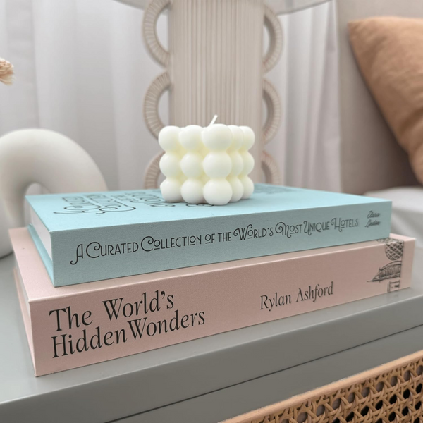 Two decorative storage books, Travel and Wanderlust covers