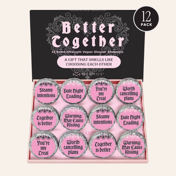 Open box of twelve Couples Series shower steamers with a 12 Pack badge.