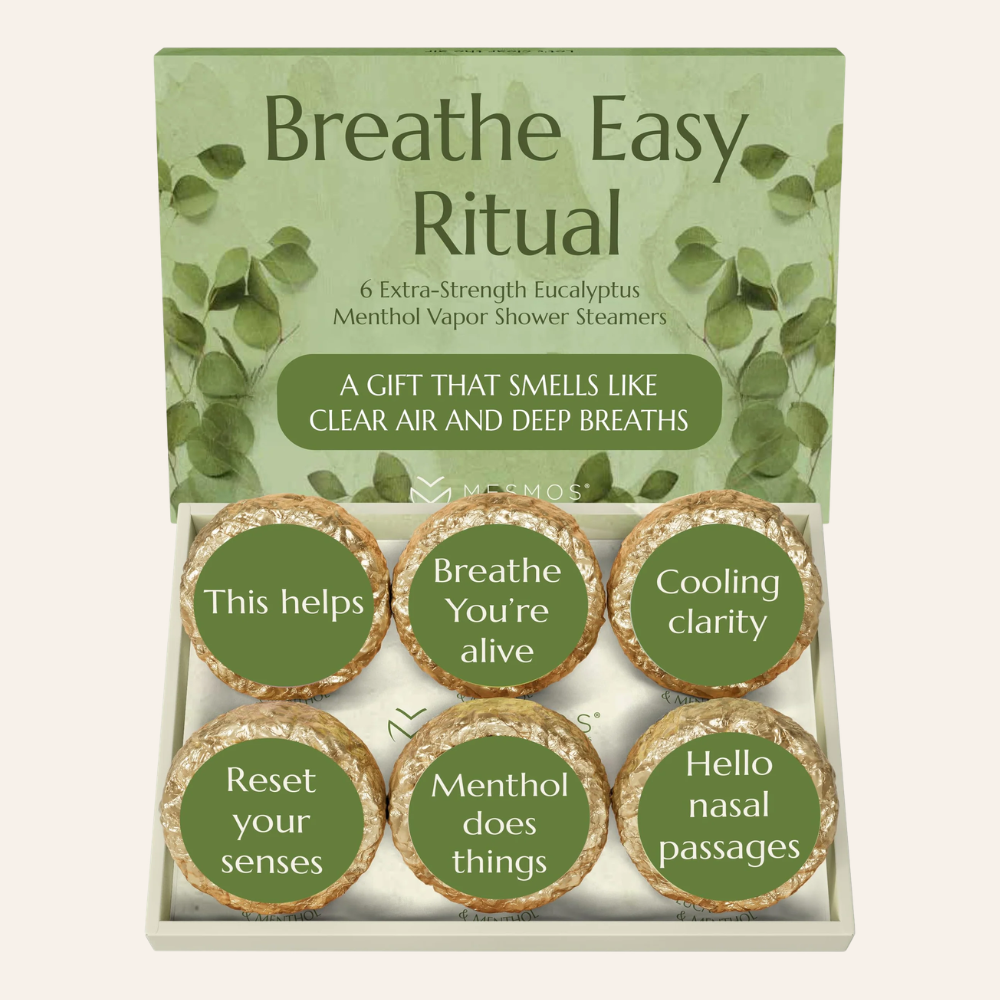 Open box of twelve eucalyptus menthol shower steamer tablets, Breathe Again