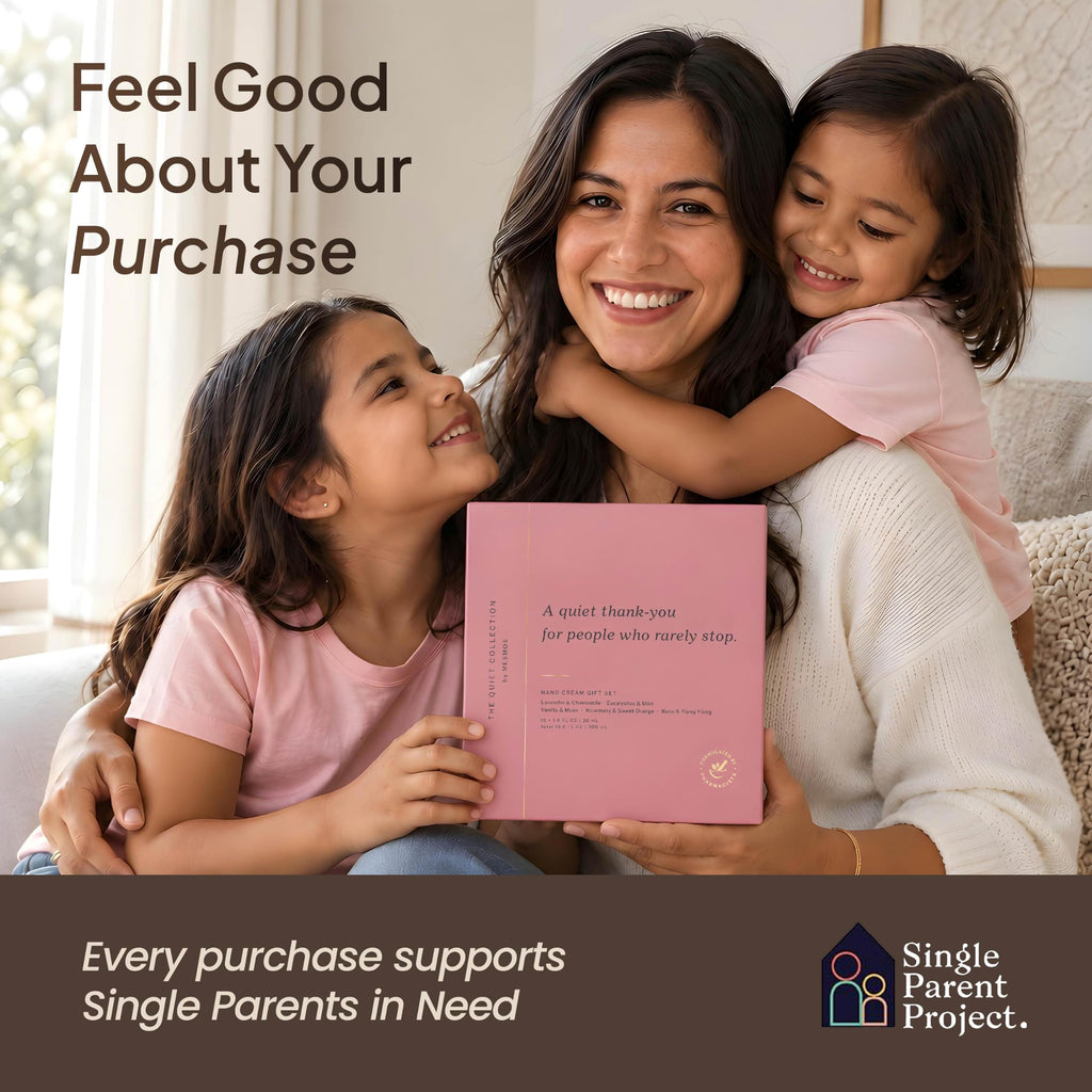 Mother with daughters and a hand cream gift box that supports the Single Parent Project