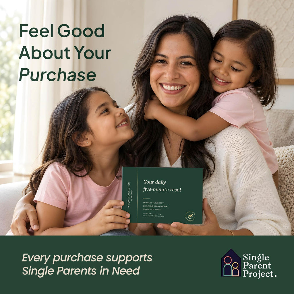 Mother hugging daughters with a shower steamer gift box that supports the Single Parent Project