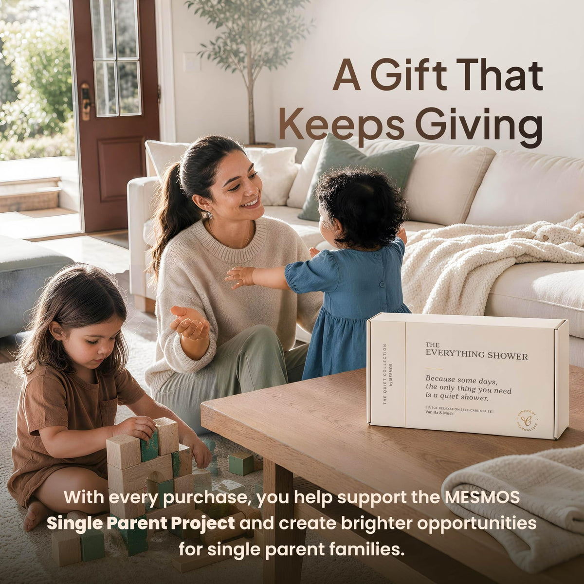 Mother playing with her children beside The Everything Shower box; purchases support the Single Parent Project-