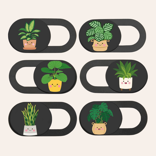 Six black sliding webcam covers, each printed with a different potted houseplant design.