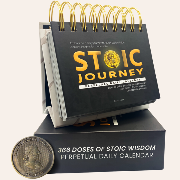 The Stoic Journey perpetual daily calendar standing on a black box with a brass coin. 366 doses of stoic wisdom.