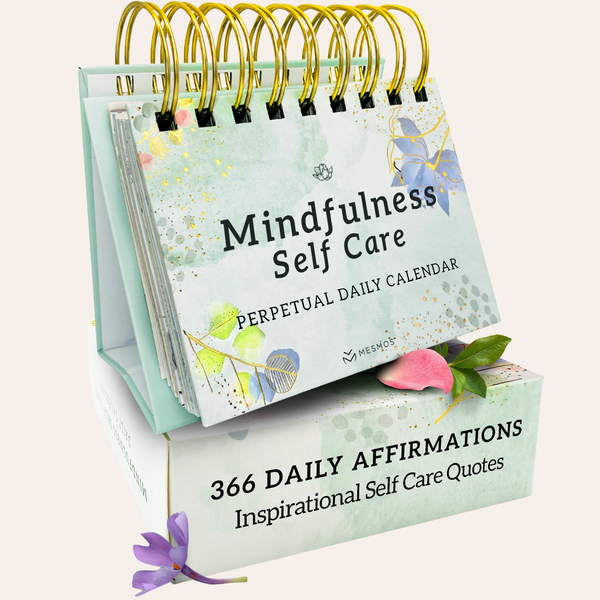 Perpetual daily desk calendar with mindfulness prompts, standing open