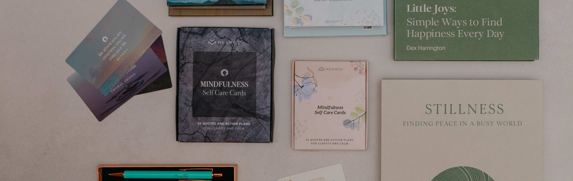 Collection of books and cards on a textured surface