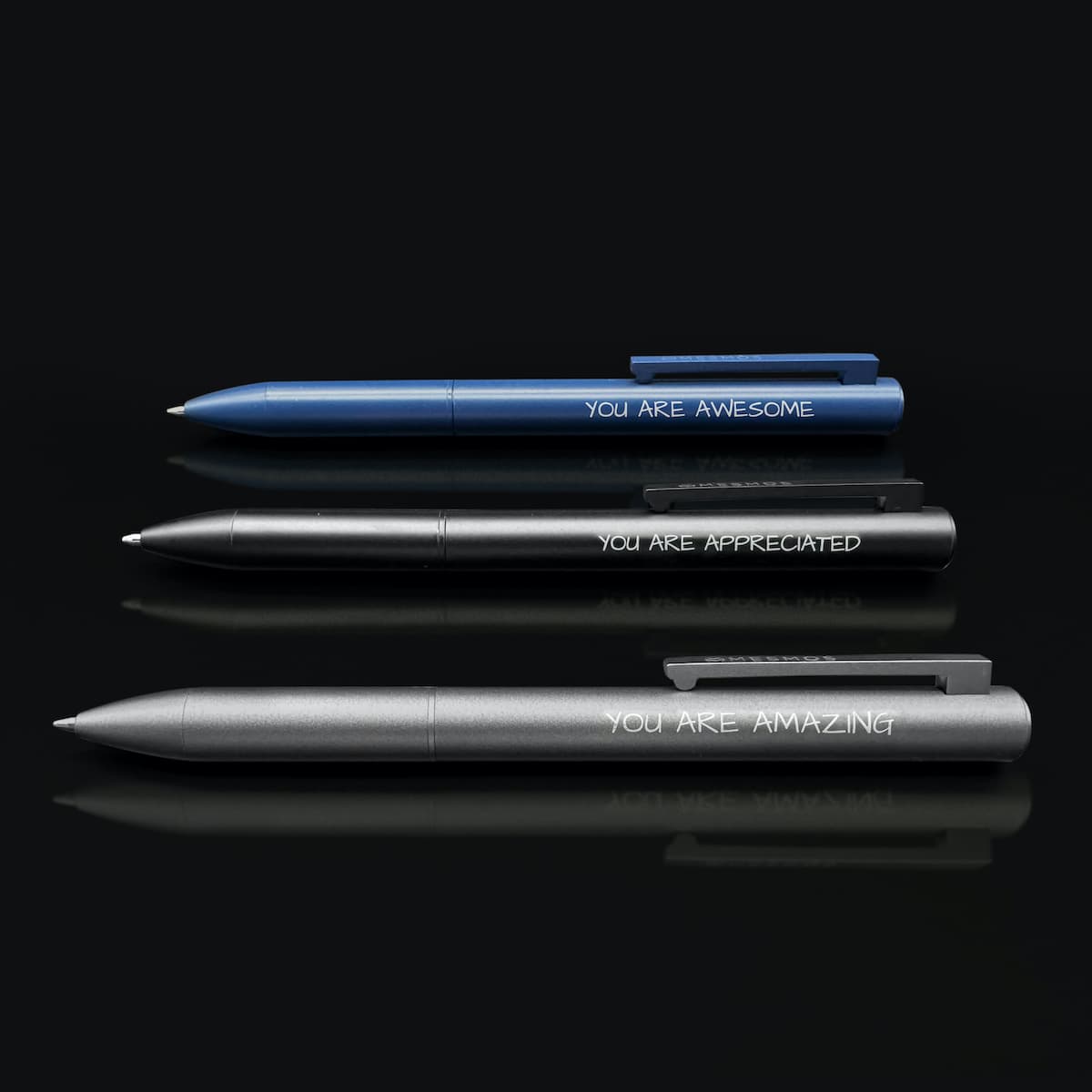 inspiring affirmation quotes engraved on ball point pens