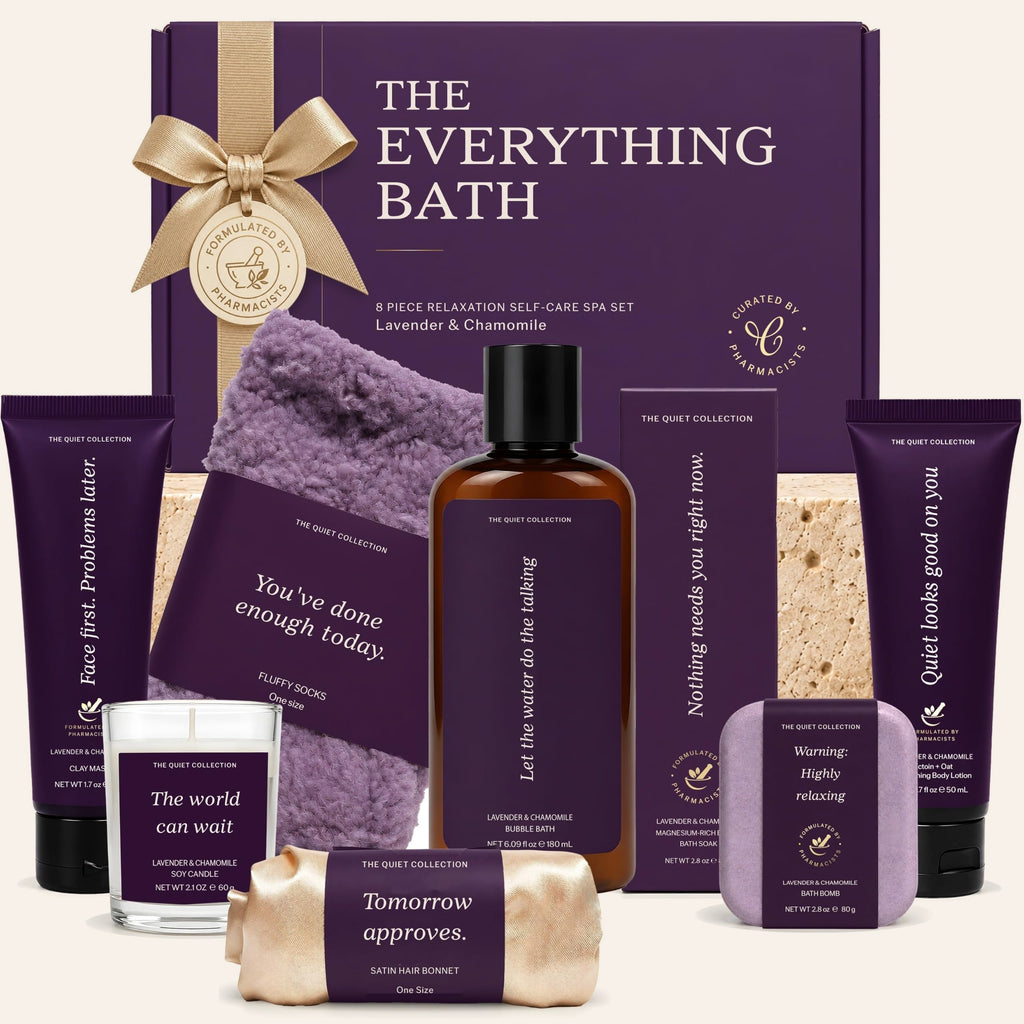 The Everything Bath purple gift box with lavender bubble bath, bath soak, bath bomb, clay mask, lotion, candle, socks and bonnet