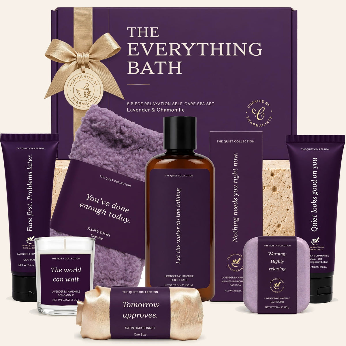 The Everything Bath purple gift box with lavender bubble bath, bath soak, bath bomb, clay mask, lotion, candle, socks and bonnet-