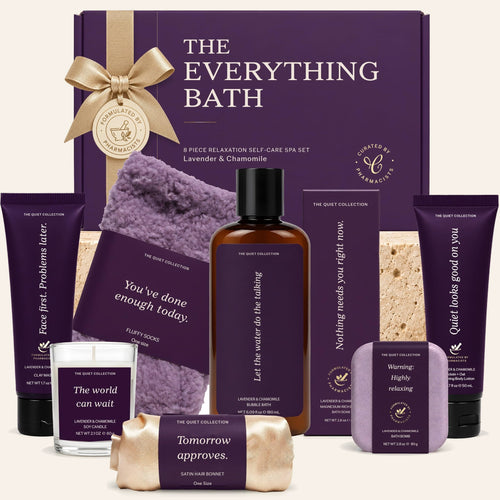 The Everything Bath purple gift box with lavender bubble bath, bath soak, bath bomb, clay mask, lotion, candle, socks and bonnet