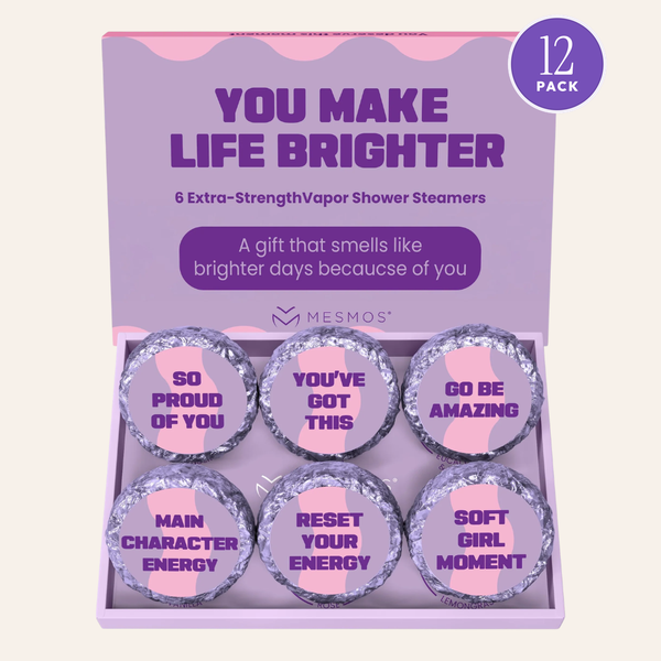 Open box of six Inspire Her Series shower steamers with a 12 Pack badge. The 12 pack ships as two boxes of 6.