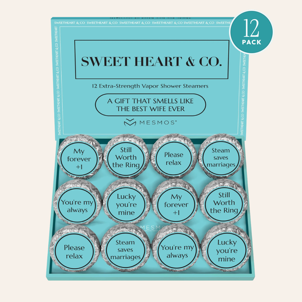 Open box of twelve Wife Series shower steamers with a 12 Pack badge.